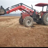 بیل . لودر تراکتوری . بارگیری ، دپو ،