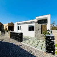 ویلاباغچه فلت نوساز 120متری شهرکی سند تک برگ