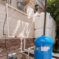 نصب پمپ اب و منبع ذخیره . لوله کشی . تعمیرات پکیج