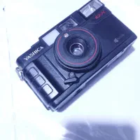 دوربین عکاسی یشیکا عطیقع و رادیو.و.و.و|کلکسیون اشیاء عتیقه|آغاجاری, |دیوار