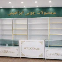 ویترین مغازه میز پاچال شلف قفسه چوبی دکور کتابخانه