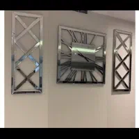 ساعت دیواری سه تیکه به همراه گلدان و گل