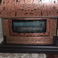 بخاری گازی شومینه شارق طوس