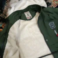 کاپشن|لباس|مرودشت, ابوذر شمالی‎|دیوار