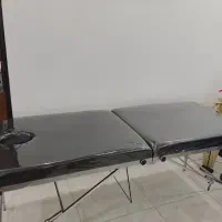 تخت ماساژ به همراه وسایل بادکش حجامت سنگ