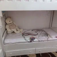تخت دوطبقه همراه با کمد