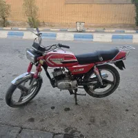 سوزوکی ax100