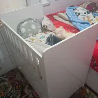 تخت کنار مادر کودک