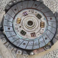 دوربین عکاسی و دیسک و صفحه پژو