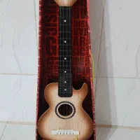 گیتار اسباب بازی نو با کارتون مفت مفت(مناسب کادو)