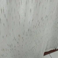 پرده مدل بارانی در رنگ توسی و طلایی