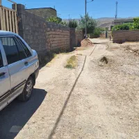 ۱۰۰ متر زمین دهنه اخلمد داخل بافت روستا