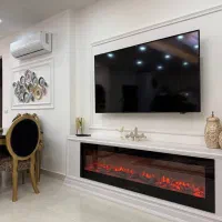شومینه برقی شیشه ای زیر تلوزیونی