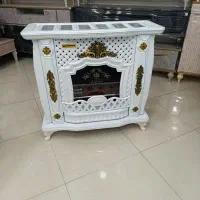 بخاری گازی 37هزار شومینه دو رنگ سفیدومشکی نوآکبند