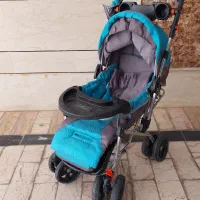 کالسکه و رو روئک و کریر نوزاد