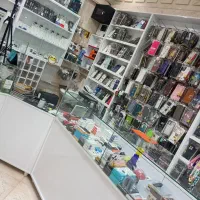 فروش کامل مغازه همراه با دکور و لوازم جانبی