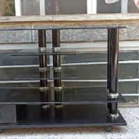 میز تلویزیون شیشه ای کاملا سالم با کشو