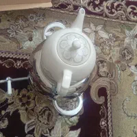 قوری کتری رو اجاق گازی