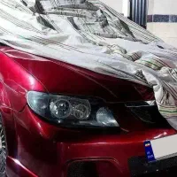 مزدا ۳۲۳ اتوماتیک قرمز صدف