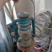 چراغ فانوس نفتی وسایل قدیمی مشک دوربین