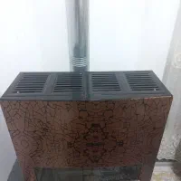 بخاری۱۲ هزار آدریان.درحد نو|بخاری، هیتر، شومینه|آستانه اشرفیه, |دیوار