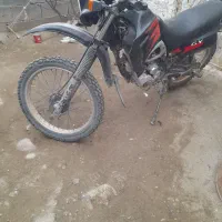 موتورتریل|موتورسیکلت|گهواره, |دیوار