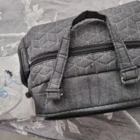 حوله و ساک نوزادی