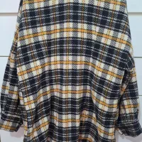 تعدادی لباس|لباس|رشت, ولکس|دیوار