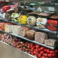 فروشنده و شاگرد مغازه