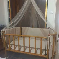 تخت نوزاد و تخت کنار مادر و ننو