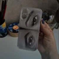 طراحی چشم پشت قاب گوشی و صفحه کتاب هدیه ای خاص|تابلو، نقاشی، عکس|دوگنبدان, |دیوار