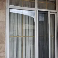 تولید درب و پنجره دوجداره و توری کشویی