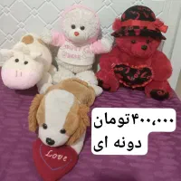 تعدادی عروسک، پوتین، شال، پالتو، پافر
