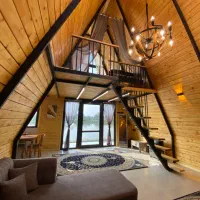 کلبه سوئیسی موکا|اجارهٔ کوتاه‌مدت ویلا و باغ|شفت, |دیوار