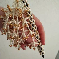 جلد خود کار مروارید بافی و دستبند هر دو 400000