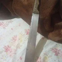 چاقویا بامبو زن