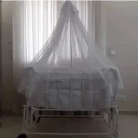 گهواره کنارمادر