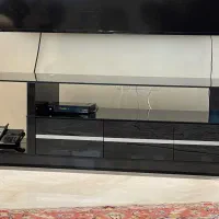 میز تلویزیون جنس  ترکیبی شیشه وام دی اف