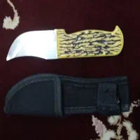 یک عدد چاقوی خوش دست و دسته استخانی