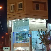 سه طبقه تجاری و مسکونی بر خیابان کلهری