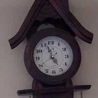 ساعت دیواری چوبی