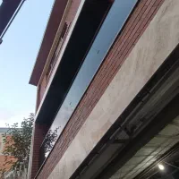 نصب شیشه نشکن و کرکره برقی و نرده شیشهای