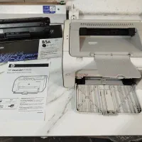 پرینتر hp ۱۰۰۵ سالم و تمیز با 2 تا کارتریج آکبند|پرینتر، اسکنر، کپی، فکس|تهران, فلسطین (میدان انقلاب)|دیوار