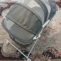 گهواره نوزاد و یک آغوشی نو و کریر
