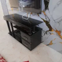 میز تلویزیون شیشه‌ای
