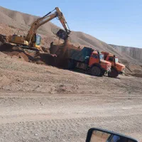 بیل مکانیکی لودر وکامیون