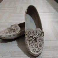 کاپشن|لباس|محمدشهر, شهرک پیام (مهرالبرز)|دیوار