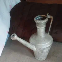 آفتابه مسی، دوربین قدیمی هردو7 تومان