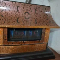 بخاری و میز تلویزیون