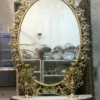آینه و کنسول و ساعت برنجی